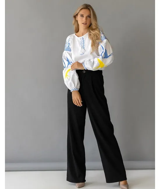 Women's embroidered blouse with swallows in Ukrainian style